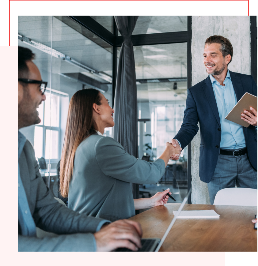 People doing handshake in meeting.